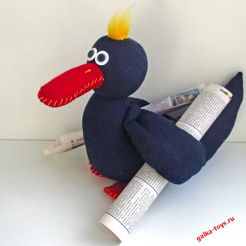 Игрушка утка.