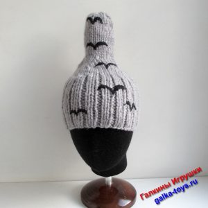 Зимняя женская вязаная шапка спицами